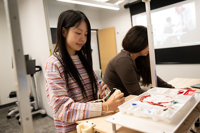 Student conducting medical simulation research in the britelab